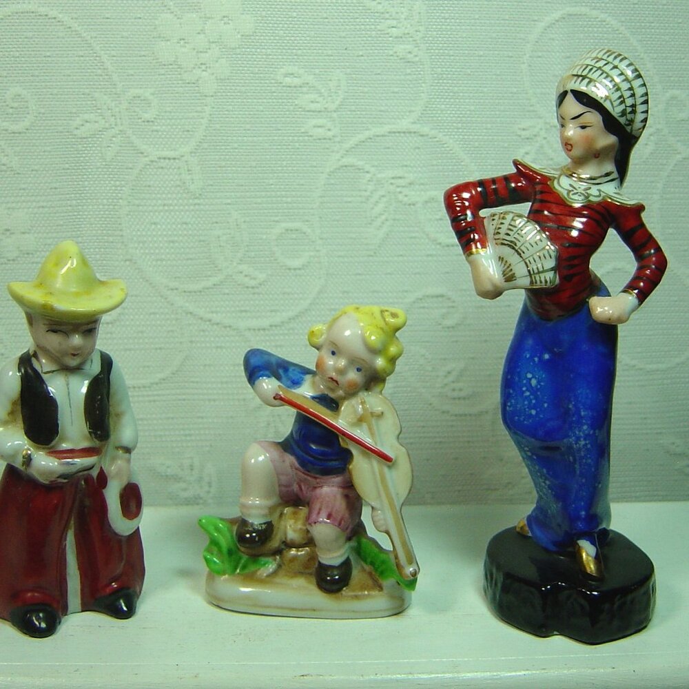 3 Vintage Occupied Japan figurines-cowboy, violinist & Geisha girl